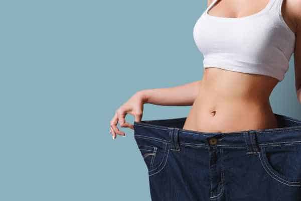 woman after fat reduction treatment Godalming