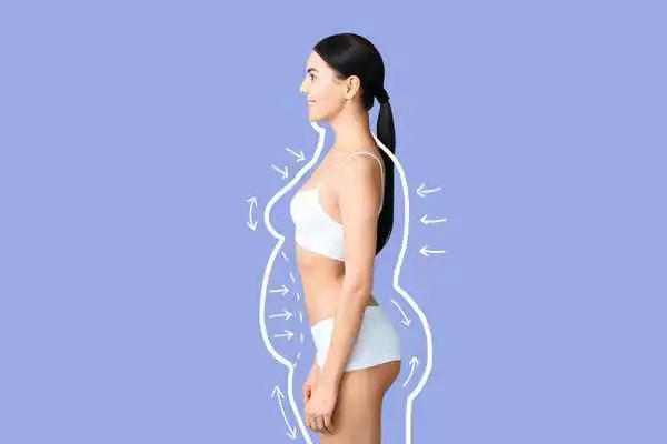 image of woman experiencing fat reduction treatment Godalming