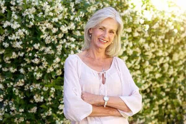 Older woman happy with urinary incontinence treatment Godalming