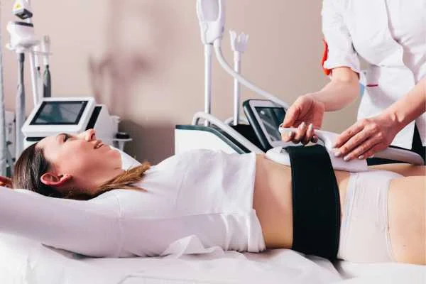 woman having body sculpting to help improve her body image and her mental health Godalming